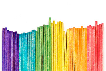 Image showing rainbow popsicle sticks on edge