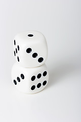 Image showing The dice on a white table