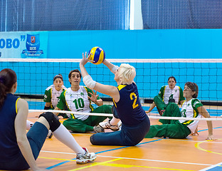 Image showing RUSSIA, MOSCOW - MAY 11: Angela Churkina (2) atack on International Sitting volleyball tournament game Ukraine vs Brazil on May 11, 2014, in Moscow, stadium CSP Izmailovo, Russia