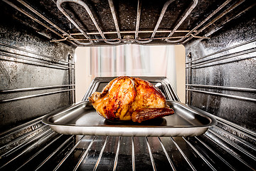 Image showing Roast chicken in the oven.