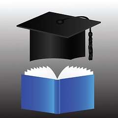 Image showing graduation cap and book