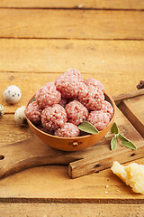 Image showing Raw meatballs