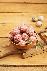 Image showing Raw meatballs