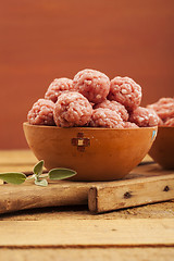 Image showing Raw meatballs