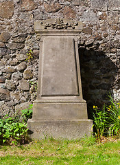 Image showing Very old gravestone on a cemetery