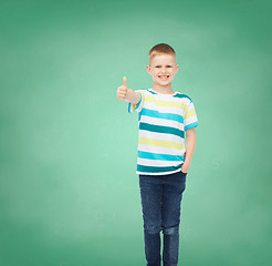 Image showing little boy in casual clothes with arms crossed