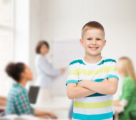 Image showing little boy in casual clothes with arms crossed