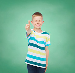 Image showing little boy in casual clothes with arms crossed