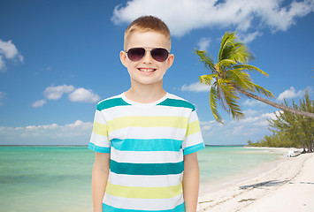 Image showing smiling little boy over green background