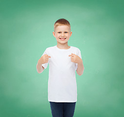 Image showing little boy in white t-shirt pointing his finger