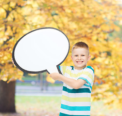 Image showing smiling little boy with blank text bubble