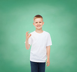 Image showing little boy in white t-shirt making ok gesture