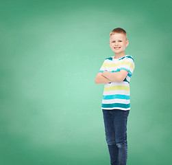 Image showing little boy in casual clothes with arms crossed