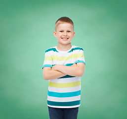 Image showing little boy in casual clothes with arms crossed