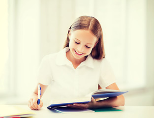 Image showing student girl studying at school