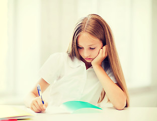 Image showing student girl studying at school