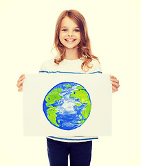 Image showing smiling little child holding picture of planet