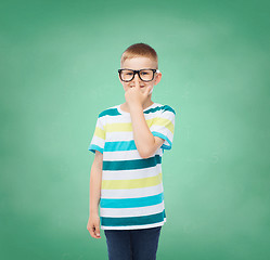 Image showing smiling little boy in eyeglasses