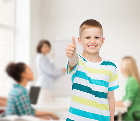 Image showing little boy in casual clothes with arms crossed