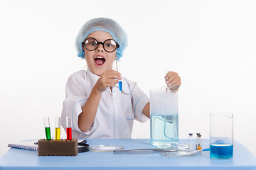 Image showing Cheerful girl chemist