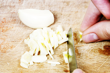 Image showing Chopping the Garlic