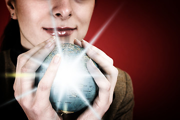 Image showing Globe in a girl's hands