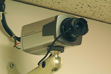 Image showing Security camera mounted on a wall