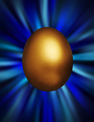 Image showing Golden egg in a blue vortex