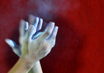 Image showing hands with a ball of powder chalk magnesia