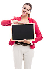 Image showing Business woman holding a shalk board
