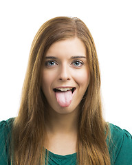 Image showing Beautiful young woman with tongue out