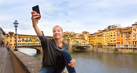Image showing Lady taking selfie in Florence.