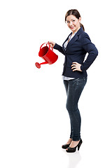 Image showing Businesswoman watering 