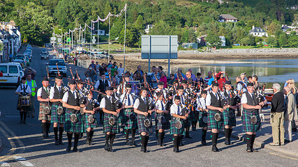 Image showing ULLAPOOL, SCOTLAND - JULY 17: Bagpipes' parade at local Highland