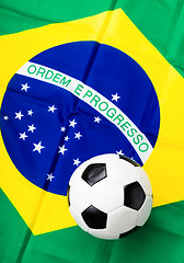 Image showing Fabric flag of Brazil and soccer ball