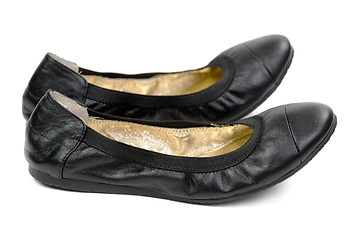 Image showing A pair of black leather shoes ballet flats