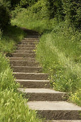 Image showing Stone steps leading up a hill sand point beach England uk