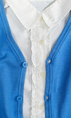 Image showing Trendy blue cardigan with a white shirt