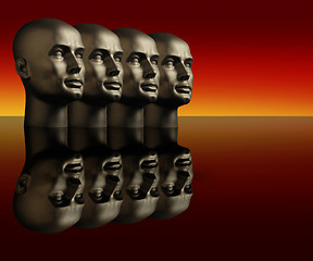 Image showing Four silver mannequin heads on a reflective surface