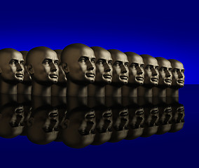 Image showing Metallic heads lined up on a reflective black surface