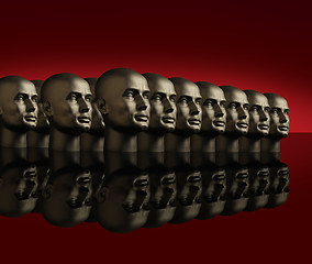 Image showing Metallic heads lined up on a reflective black surface