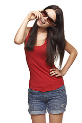 Image showing Happy playful woman in sunglasses