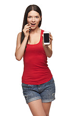 Image showing Excited surprised woman showing cell phone