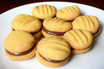 Image showing Plate of shortbread biscuits with chocolate filling