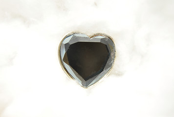 Image showing Heart of glass in cotton