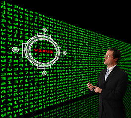 Image showing Man detecting computer virus in a firewall of machine code