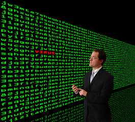 Image showing Man detecting computer virus in a firewall of machine code