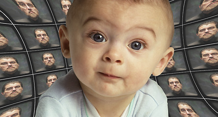 Image showing A baby facing the camera surrounded by distorted screens of an O