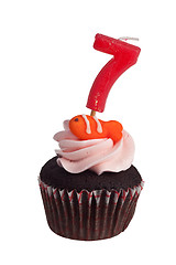 Image showing Mini cupcake with birthday candle for seven year old