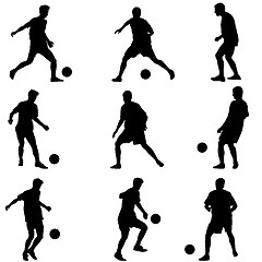 Image showing Different poses silhouettes of soccer players with the ball. Vec